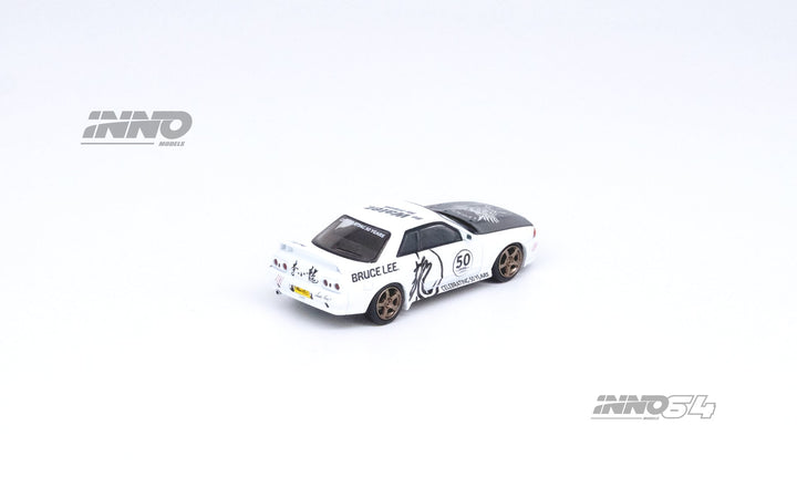 Nissan Skyline GT-R's Series Honoring Bruce Lee's 50th Anniversary 1:64 by Inno64 x TINY White Angled Rear View