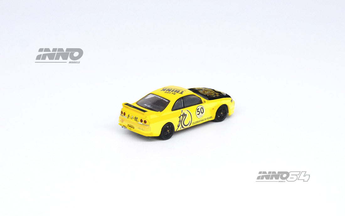 Nissan Skyline GT-R's Series Honoring Bruce Lee's 50th Anniversary 1:64 by Inno64 x TINY Yellow Angled Rear View