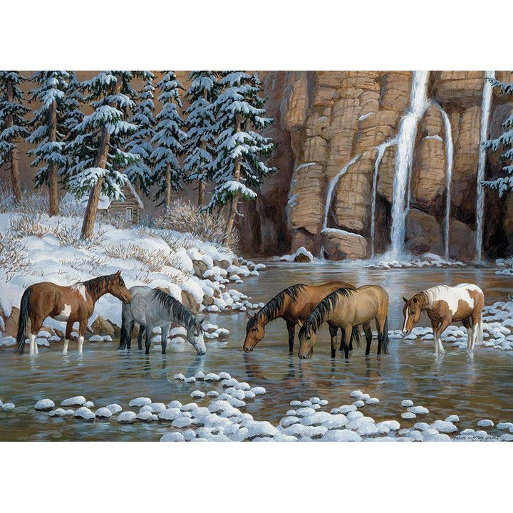 Cobble Hill Spirit of the Rockies 1000 Piece Jigsaw Puzzle featuring horses beside waterfalls in a snowy mountain landscape image