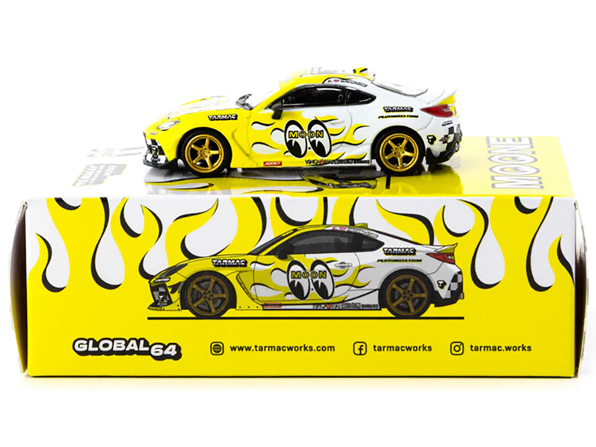 Toyota GR86 RHD (Right Hand Drive) "MoonEyes" White with Yellow Flames and Graphics "Global64" Series 1/64 Diecast Model by Tarmac Works 2