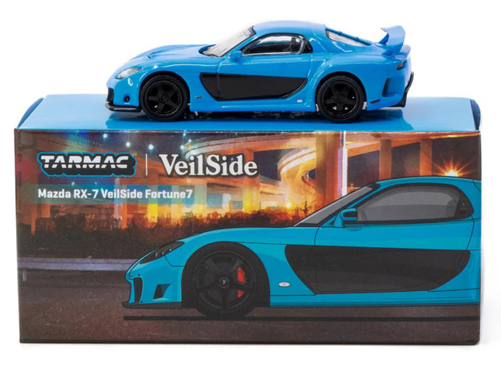 Blue Mazda RX-7 VeilSide Fortune7 1/64 diecast model with Tarmac Works Global64 packaging.