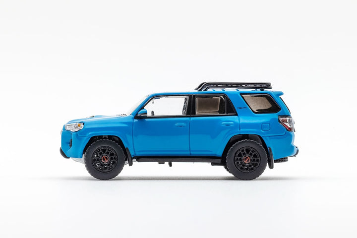 Toyota 4 Runner SUV 4x4 Off Road with Dinghy in Blue 1:64 Diecast by GCD Side View