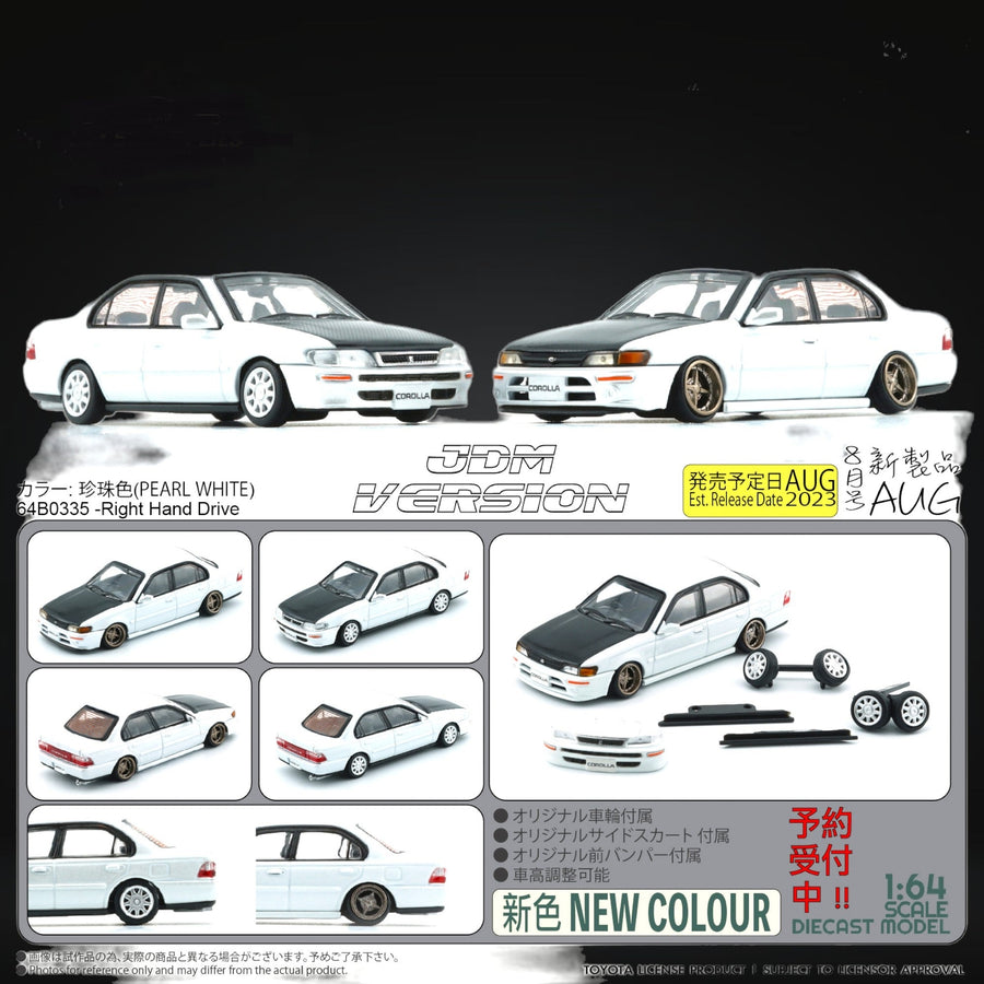 Toyota Corolla AE100 in Pearl White with Carbon Fiber Hood RHD 1:64 64B0335