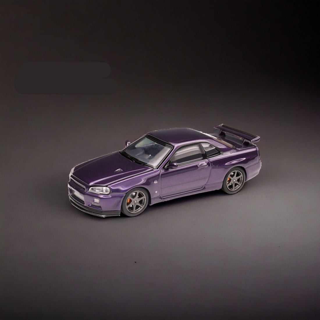 Nissan Skyline GT-R R34 Z-Tune Midnight Purple 1:64 by MOTORHELIX Angled Front View