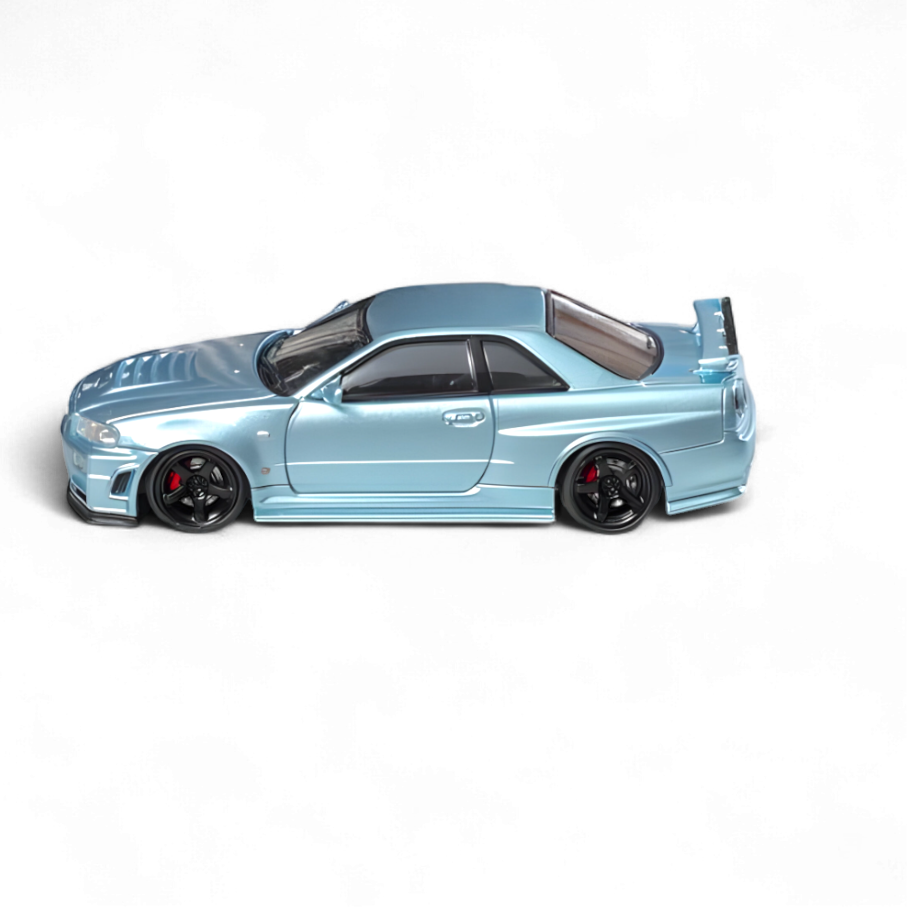 Nissan Skyline R34 GT-R Nismo Z-Tune Ice Blue 1:64 by Fuji 3
