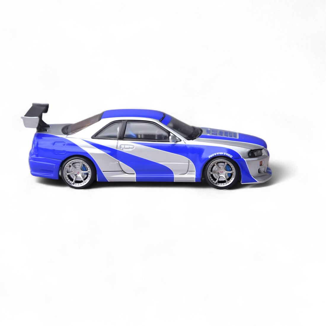 Nissan Skyline GT-R R34 NFS Silver Blue 1:64 by Focal Horizon  5
