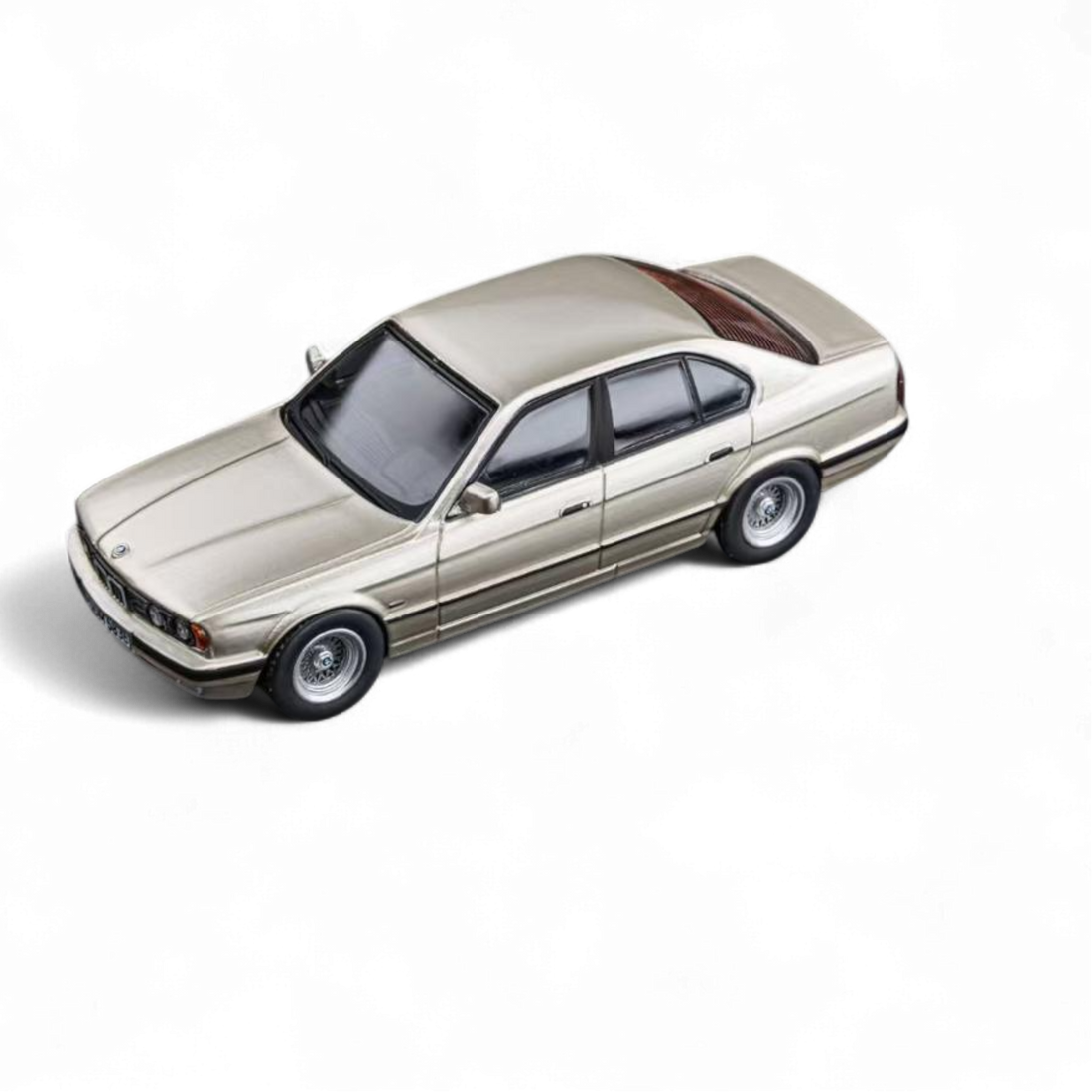 BMW E34 5-Series Sedan Cashmere Beagle Gold 1:64 by DCM 