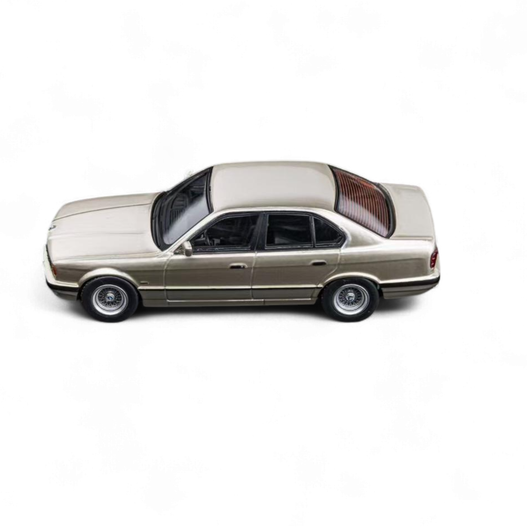 BMW E34 5-Series Sedan Cashmere Beagle Gold 1:64 by DCM  2