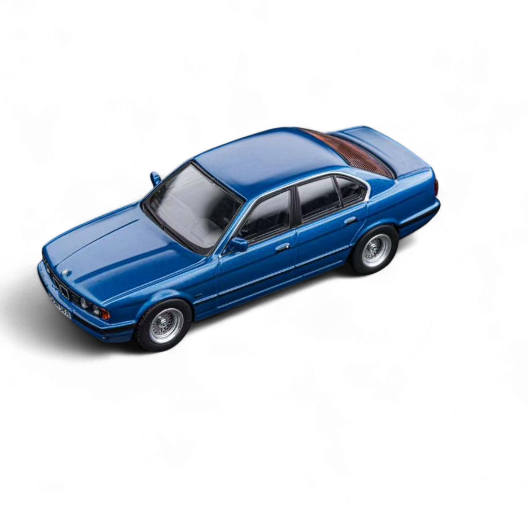 BMW E34 5-Series Sedan Avis Metallic Blue 1:64 by DCM 