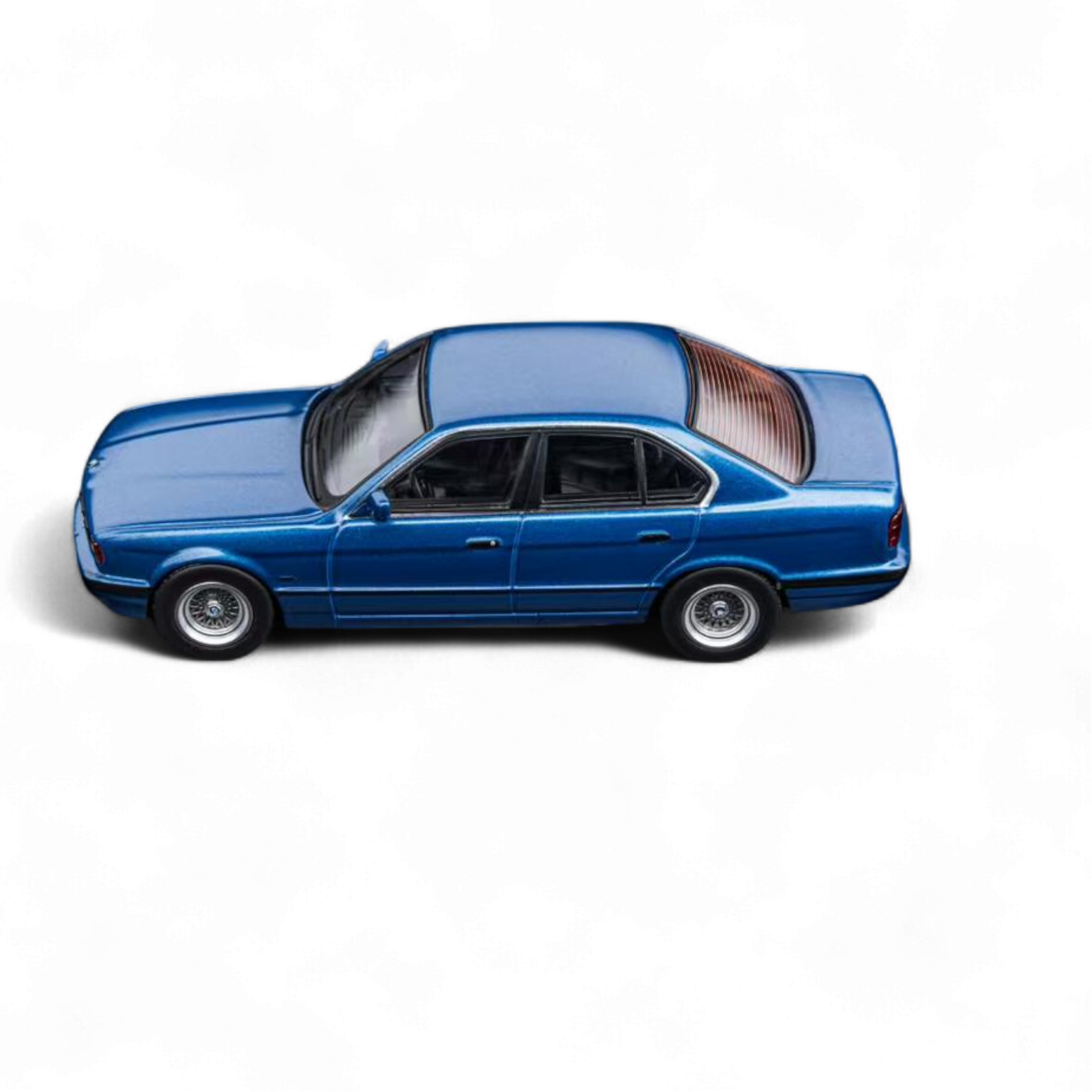 BMW E34 5-Series Sedan Avis Metallic Blue 1:64 by DCM  2