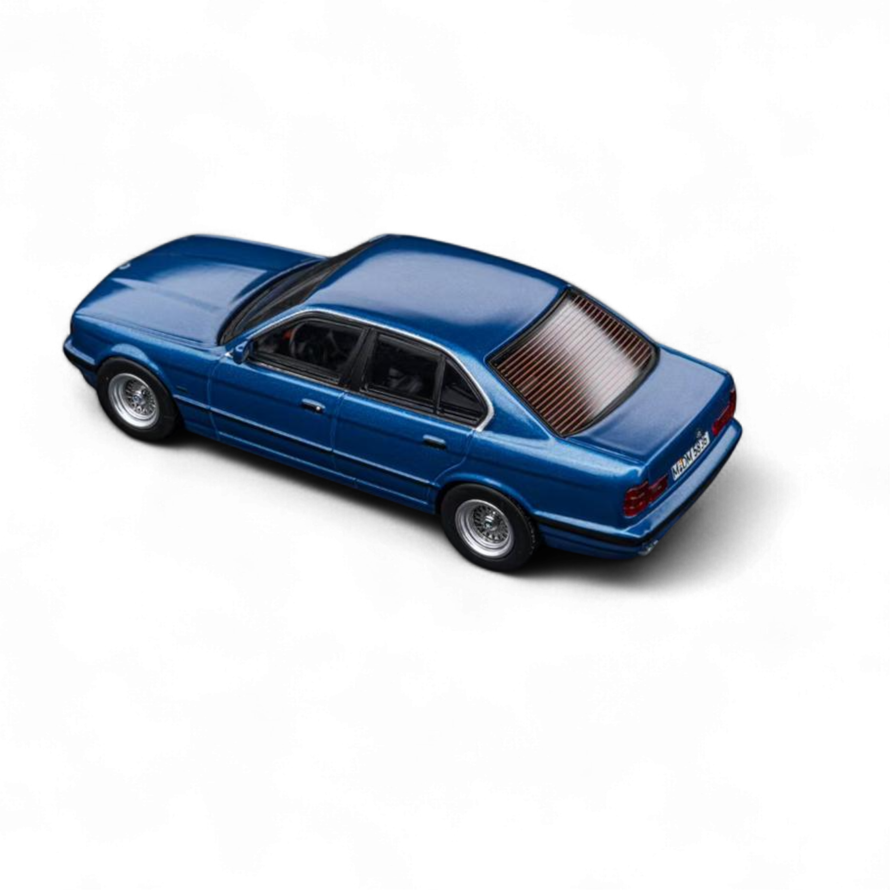 BMW E34 5-Series Sedan Avis Metallic Blue 1:64 by DCM  4