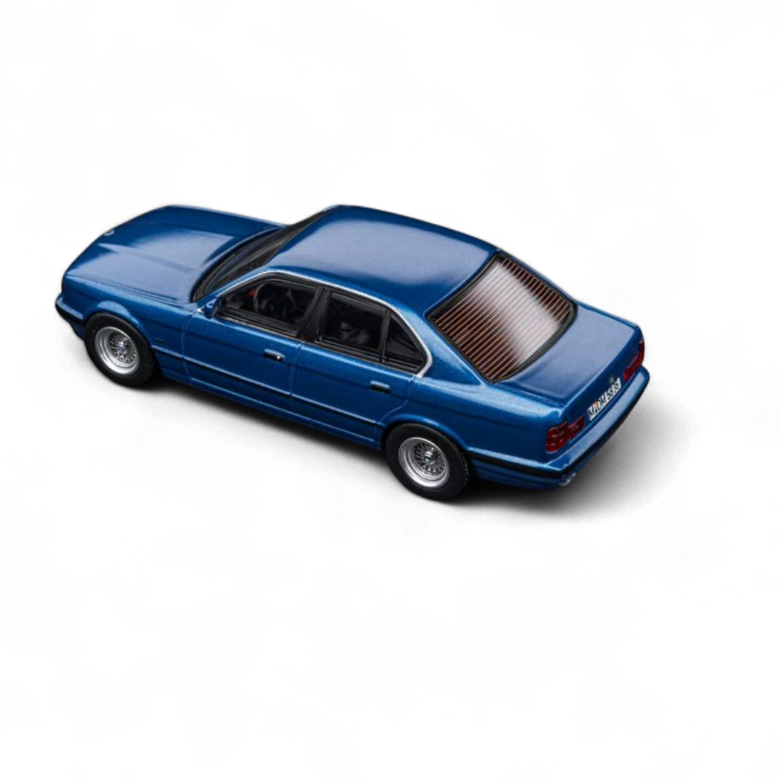 BMW E34 5-Series Sedan Avis Metallic Blue 1:64 by DCM  4