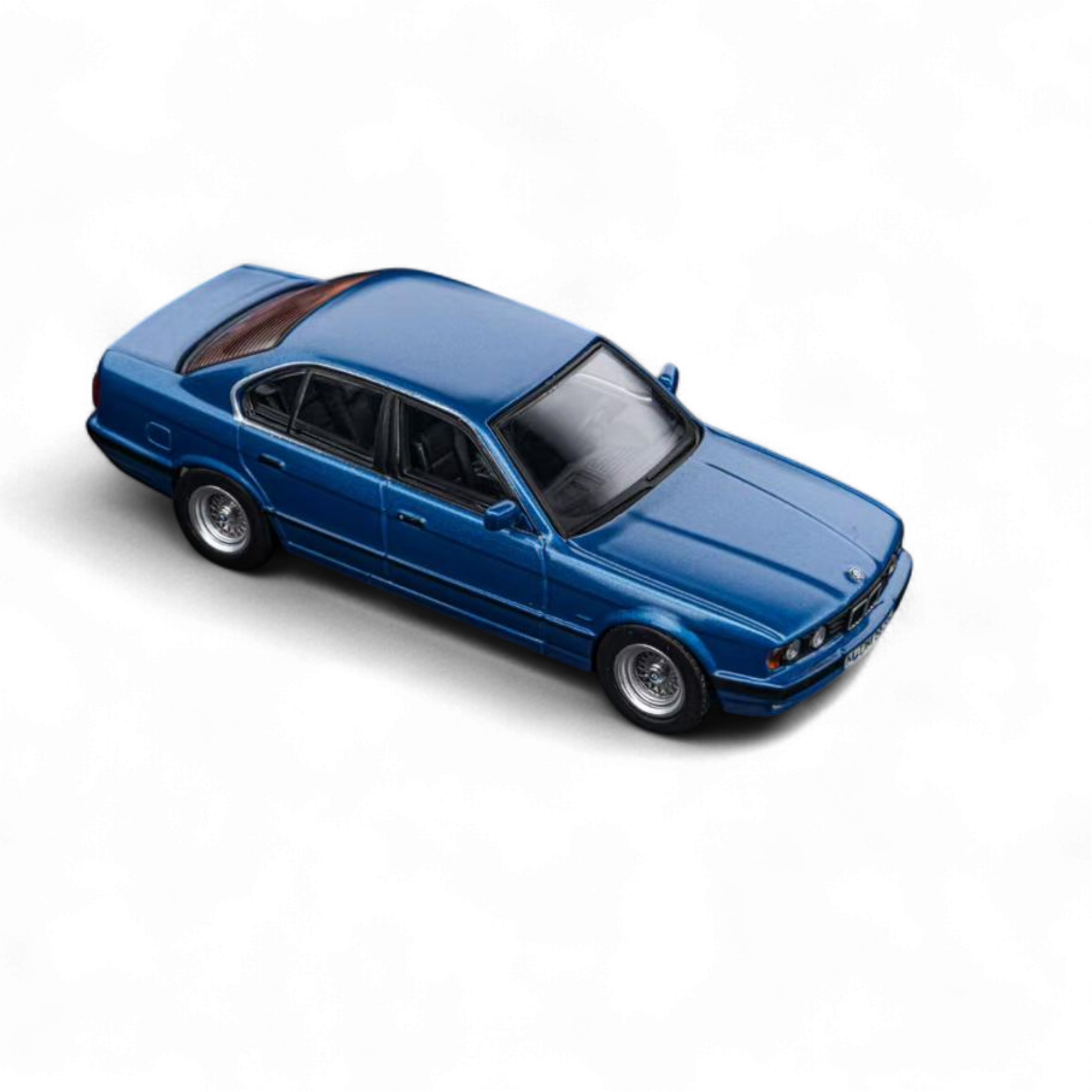 BMW E34 5-Series Sedan Avis Metallic Blue 1:64 by DCM  3