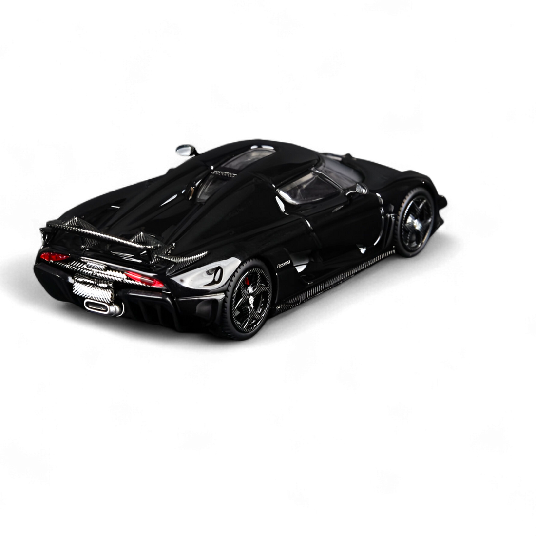 Front three-quarter view of Koenigsegg Regera Pearl Black collectible
