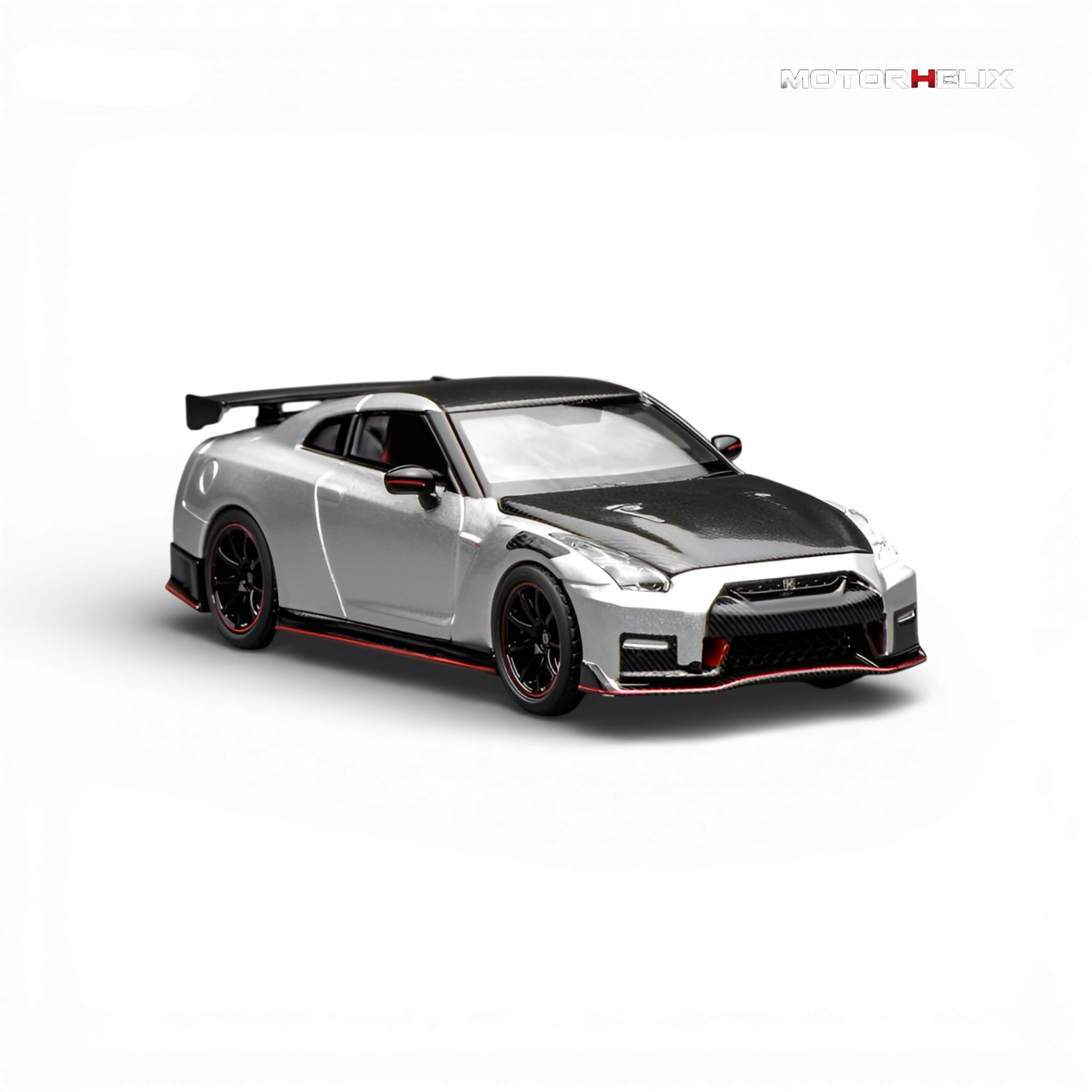 Front three-quarter view of the MotorHelix Nissan GT-R NISMO (R35) Special Edition 2022 highlighting the aggressive front fascia, forged wheels, and premium silver finish.