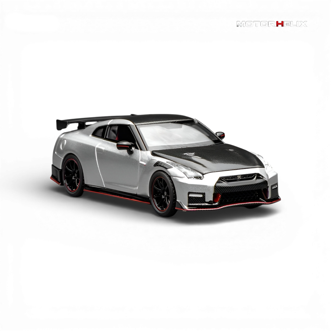Front three-quarter view of the MotorHelix Nissan GT-R NISMO (R35) Special Edition 2022 highlighting the aggressive front fascia, forged wheels, and premium silver finish.