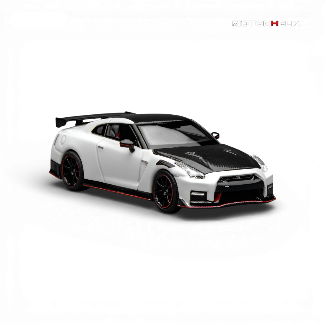 Front three-quarter view of the MotorHelix Nissan GT-R NISMO (R35) Special Edition 2022 1:64 diecast model finished in Brilliant White Pearl.