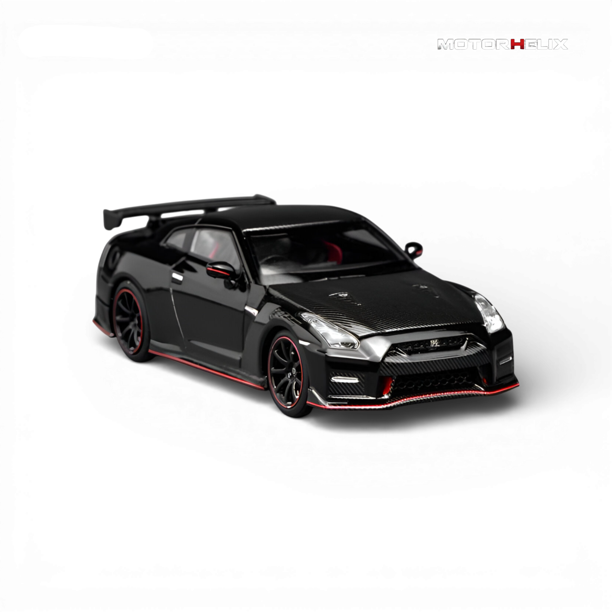 Another close-up front view of the MotorHelix Nissan GT-R NISMO (R35) Special Edition 2022 highlighting the sculpted grille, LED headlights, and carbon fiber accents.
