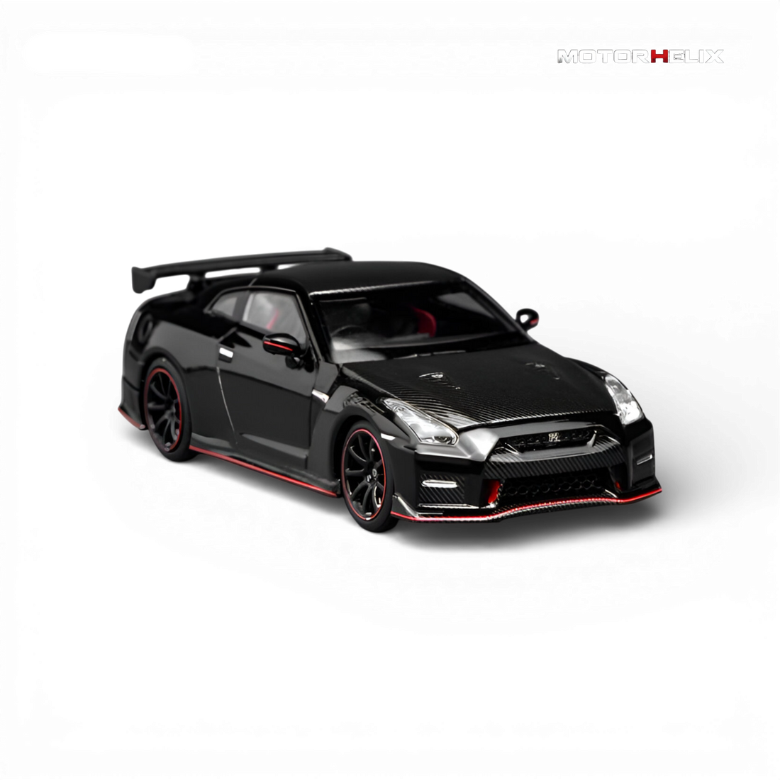 Another close-up front view of the MotorHelix Nissan GT-R NISMO (R35) Special Edition 2022 highlighting the sculpted grille, LED headlights, and carbon fiber accents.