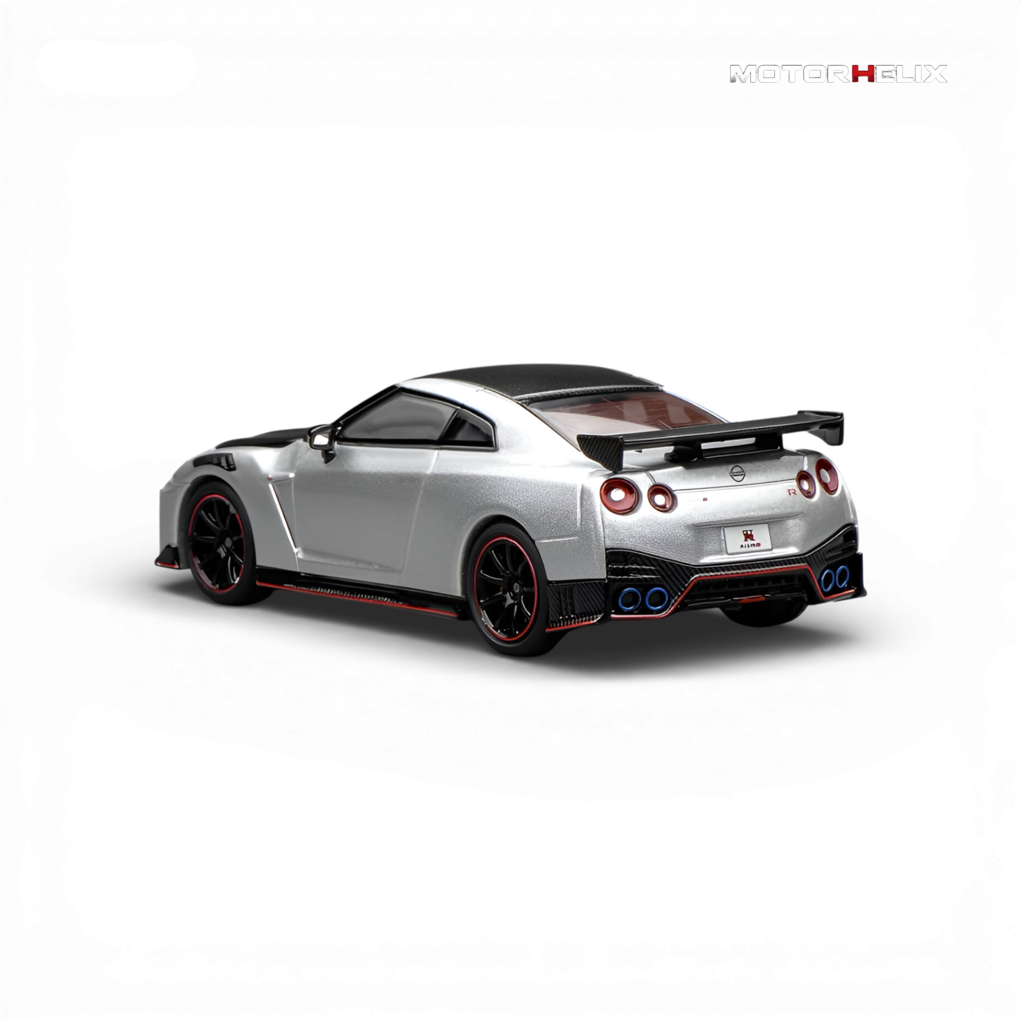 Rear three-quarter view of the MotorHelix Nissan GT-R NISMO (R35) Special Edition 2022 emphasizing the rear wing, quad exhaust, and race-inspired diffuser.