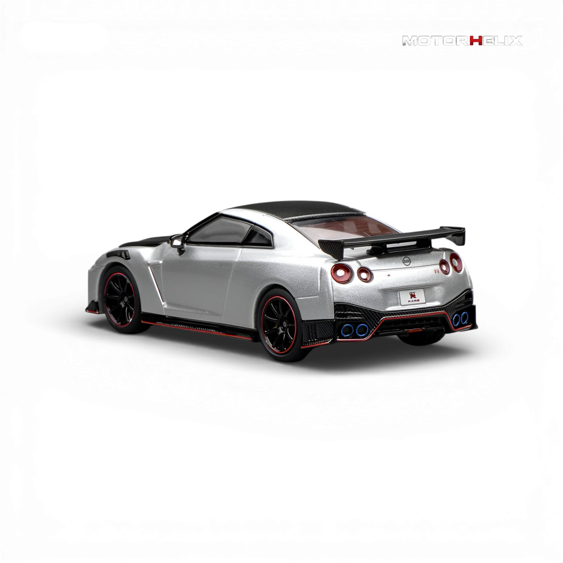 Rear three-quarter view of the MotorHelix Nissan GT-R NISMO (R35) Special Edition 2022 emphasizing the rear wing, quad exhaust, and race-inspired diffuser.