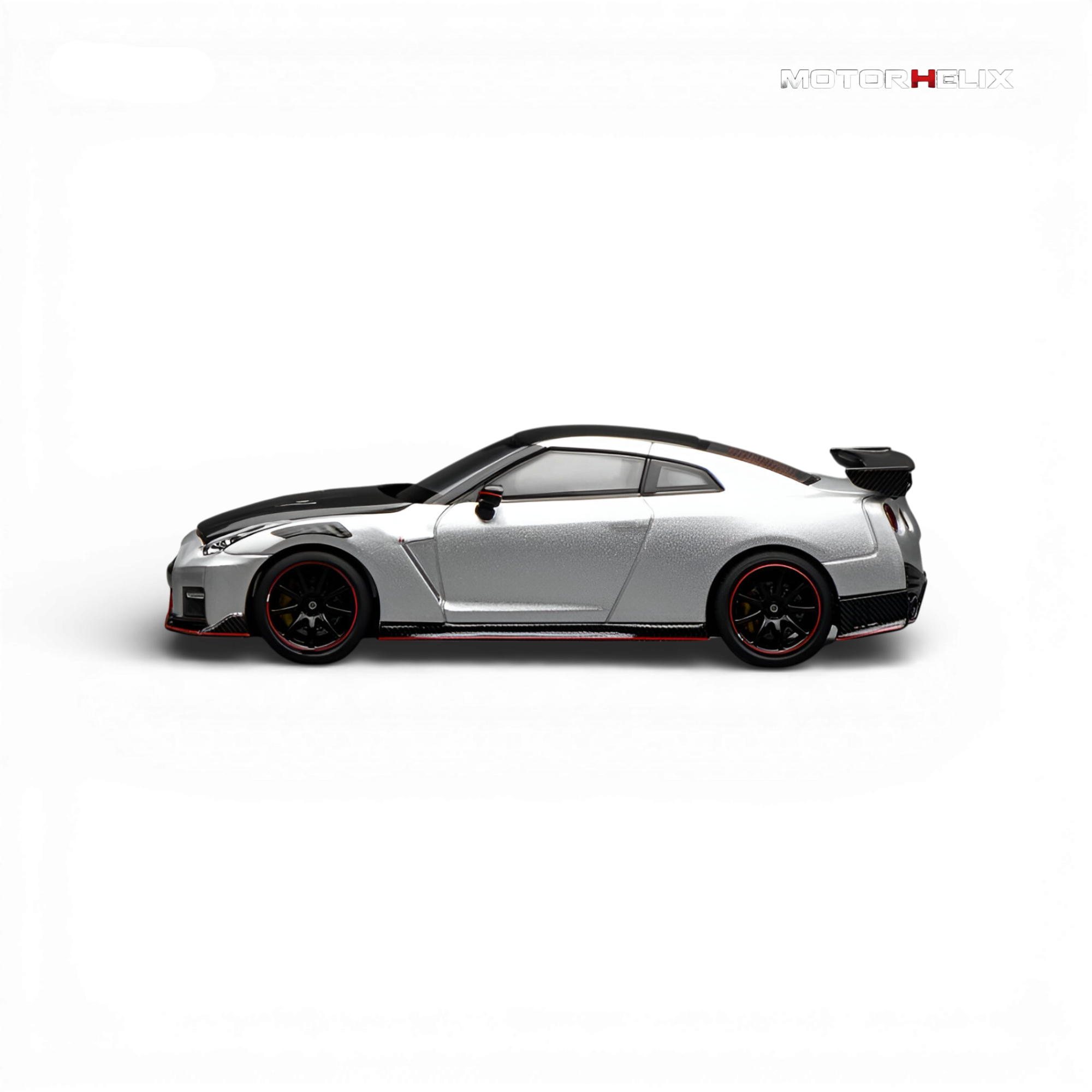 Side view of the MotorHelix Nissan GT-R NISMO (R35) Special Edition 2022 displaying the sleek profile and collector-quality detailing.