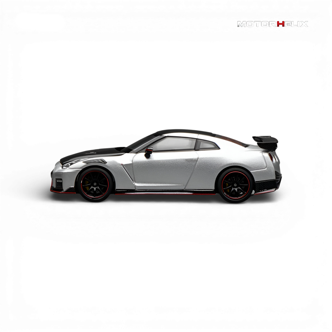 Side view of the MotorHelix Nissan GT-R NISMO (R35) Special Edition 2022 displaying the sleek profile and collector-quality detailing.