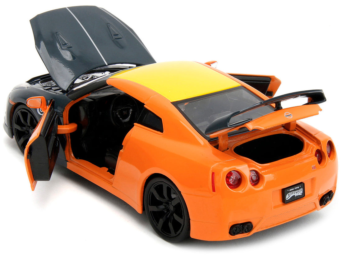 2009 Nissan GT-R (R35) Orange and Dark Gray with Yellow Top and Graphics and Naruto Diecast Figure "Naruto Shippuden" (2009-2017) TV Series "Anime Hollywood Rides" Series 1/24 Diecast Model Car by Jada-2