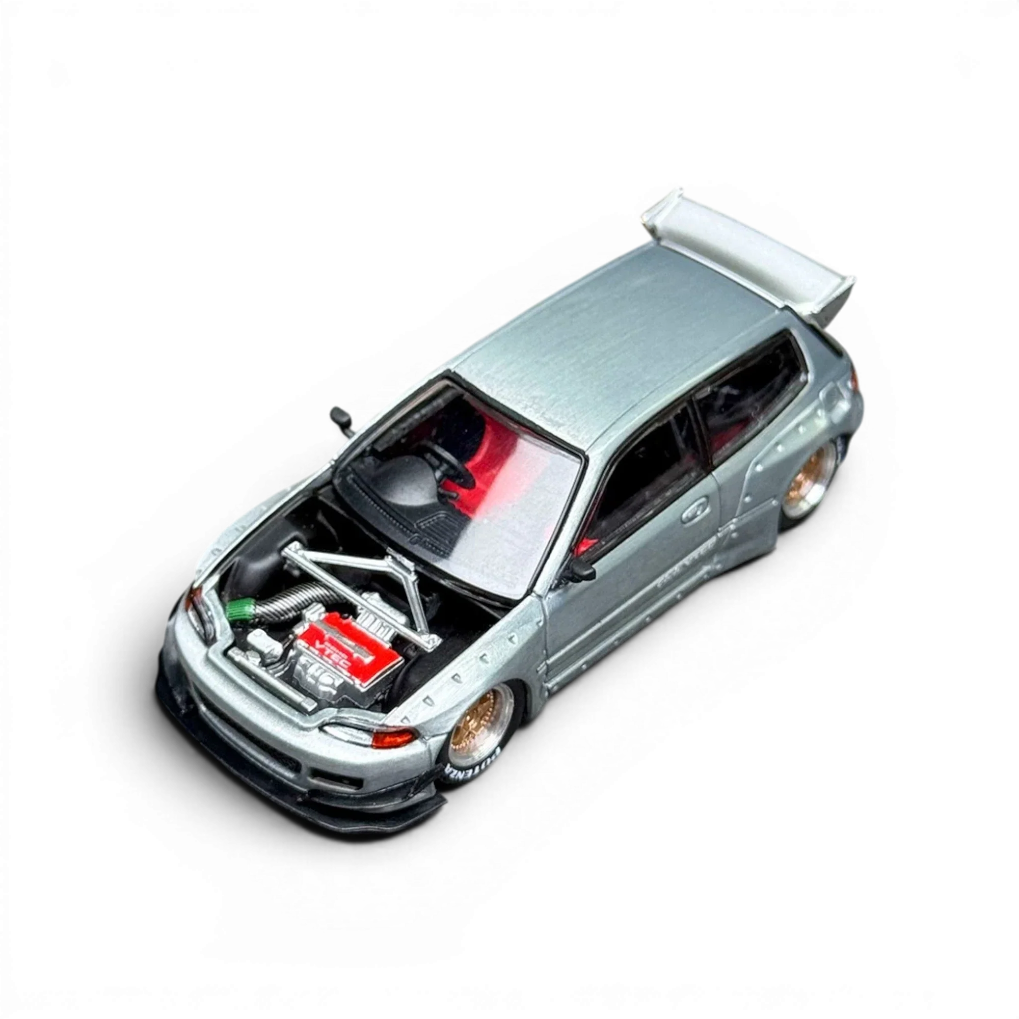 Pop Race Honda Civic EG6 Raw Metal 1:64 diecast model shown with collectible packaging