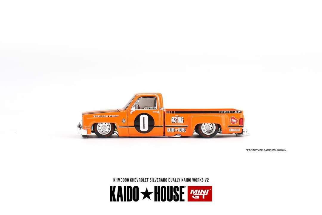 Chevrolet Silverado DUALLY KAIDO V2 Orange 1:64 by Mini GT KHMG090 Side View 2