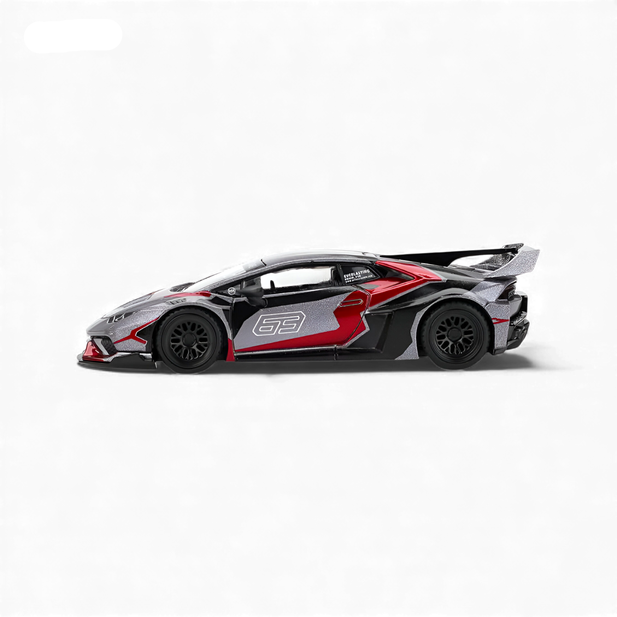 Side profile of the Mini GT Lamborghini Huracán GT RONIN 1:64 diecast model highlighting its aggressive aerodynamic bodywork and exclusive RONIN graphics.