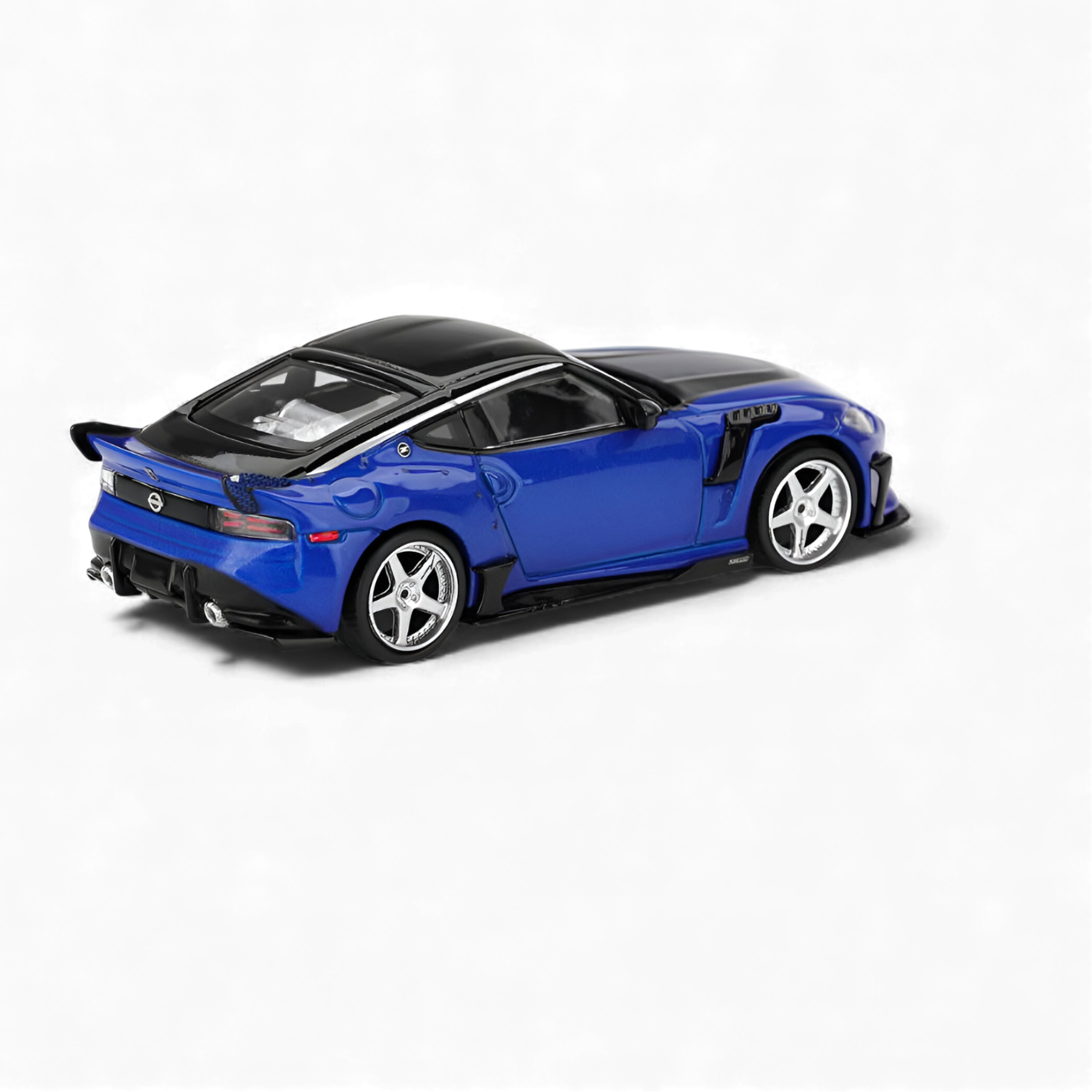 Side profile of Mini GT Nissan Z VeilSide FFZ400 collectible