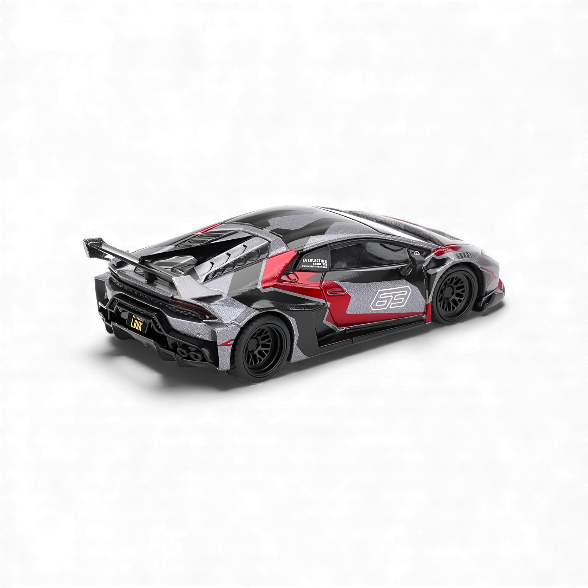 Rear three-quarter view of the Mini GT Lamborghini Huracán GT RONIN 1:64 diecast model showcasing the race-inspired rear wing, diffuser, and premium detailing.
