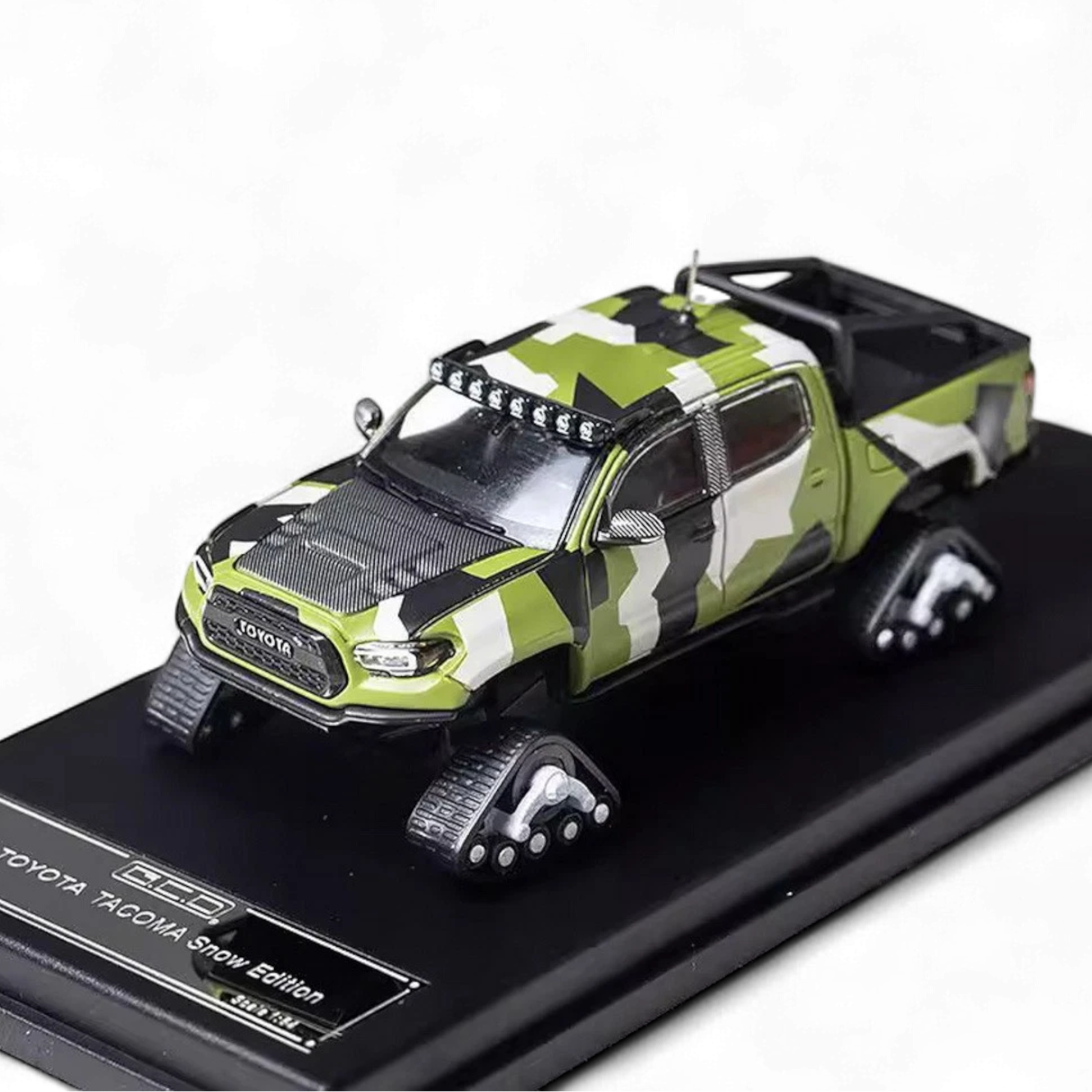Toyota TACOMA SNOW VERSION in Green Camo & 3PMSF Tires 1:64 by GCD 4