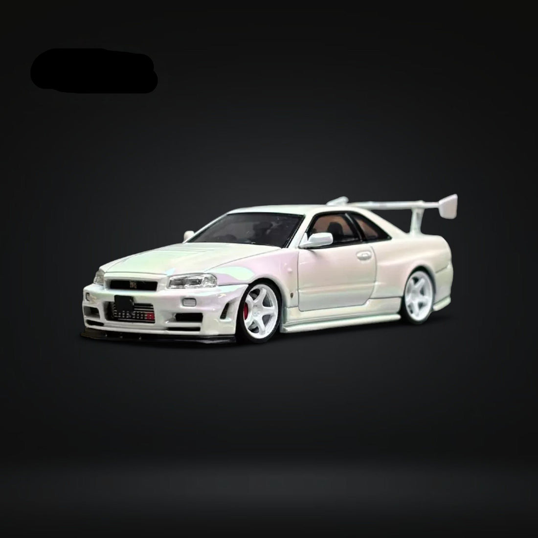 Skyline GT-R R34 Nismo Z-Tune High Wing White Pearl 1:64 by Fuji