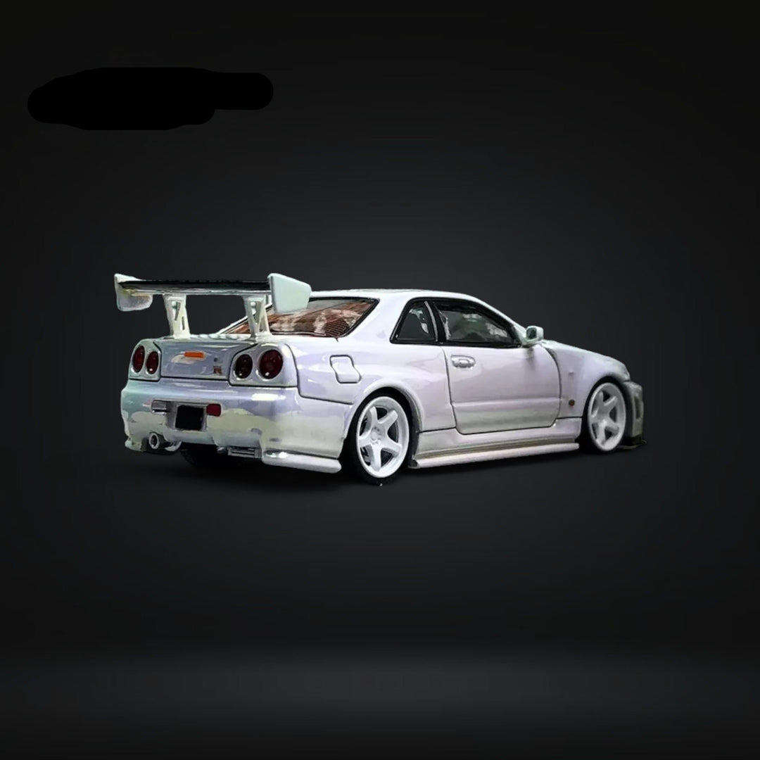 Skyline GT-R R34 Nismo Z-Tune High Wing White Pearl 1:64 by Fuji Angled Rear View