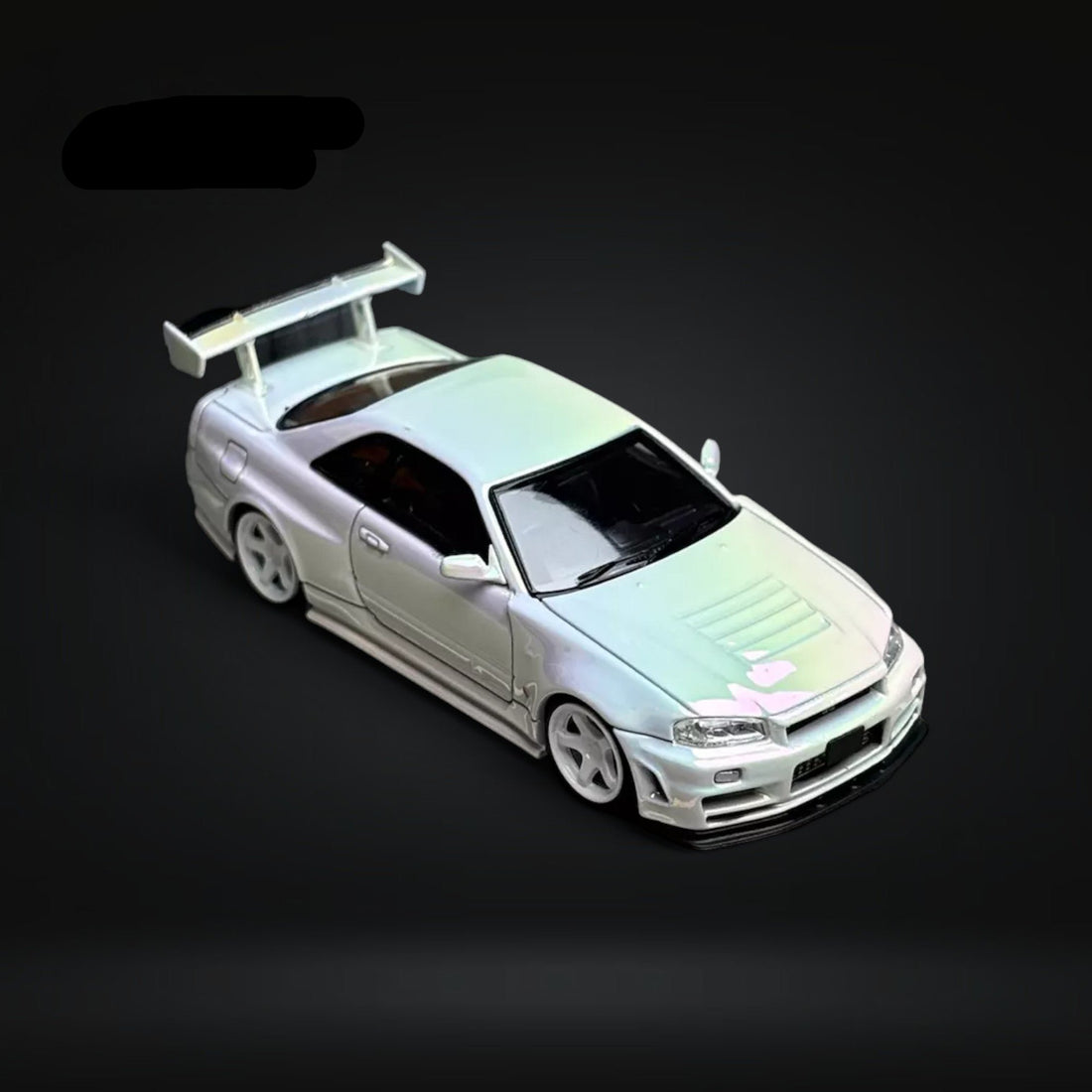 Skyline GT-R R34 Nismo Z-Tune High Wing White Pearl 1:64 by Fuji Top View