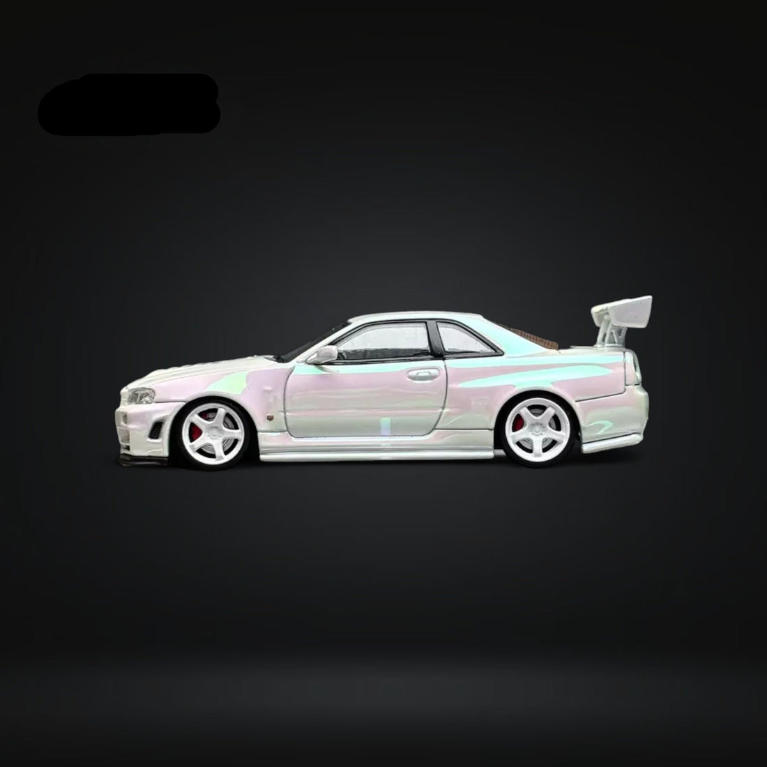 Skyline GT-R R34 Nismo Z-Tune High Wing White Pearl 1:64 by Fuji Side View