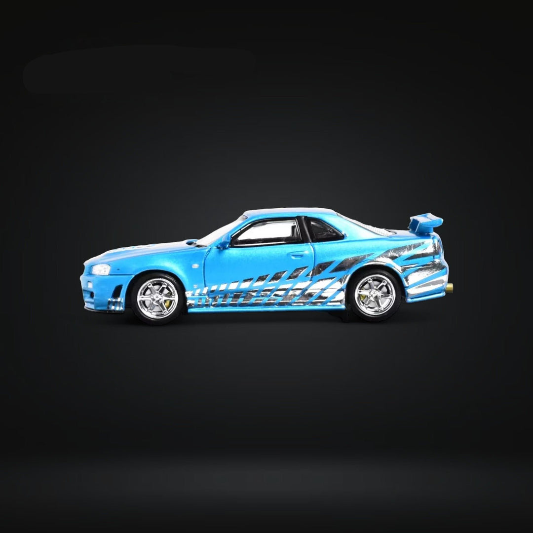 Nissan Skyline GT-R R34 Z-Tune Guru Chrome Blue 888pcs 1:64 by Stance Hunters Side View