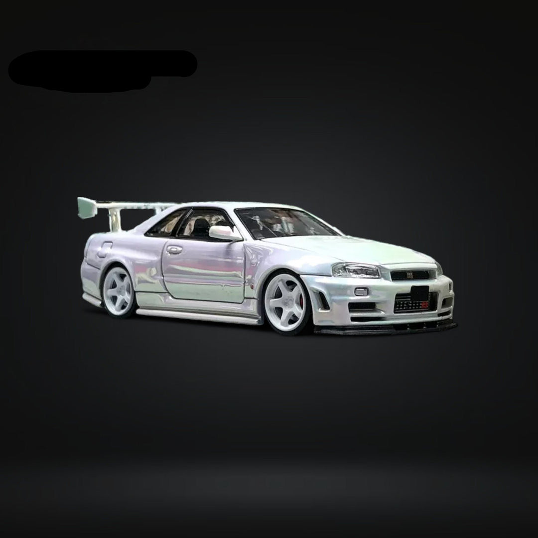 Skyline GT-R R34 Nismo Z-Tune High Wing White Pearl 1:64 by Fuji Front Angle View