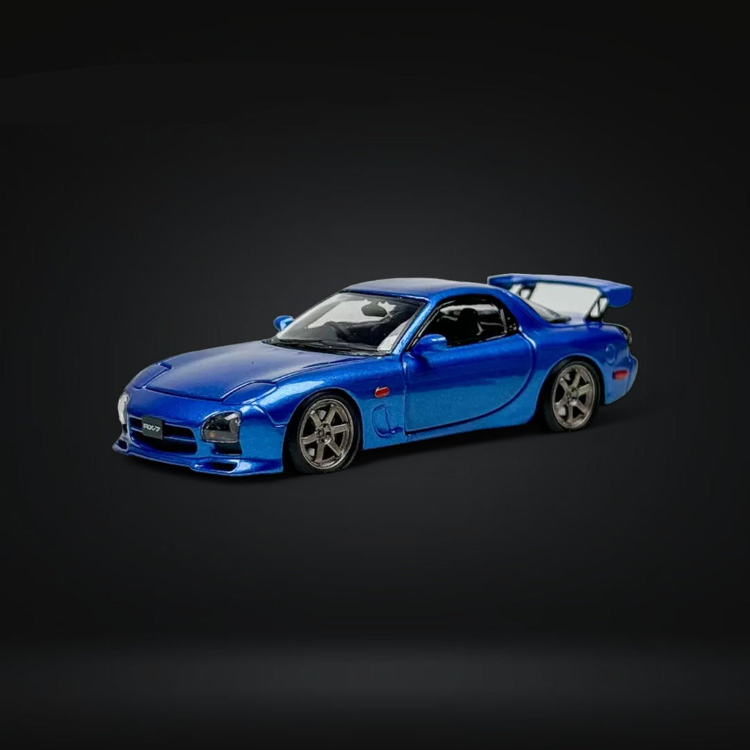 Mazda RX-7 FD3S Metallic Blue Fully Openeable Standard Base 1:64 by PGM Angled Driver Side Front View