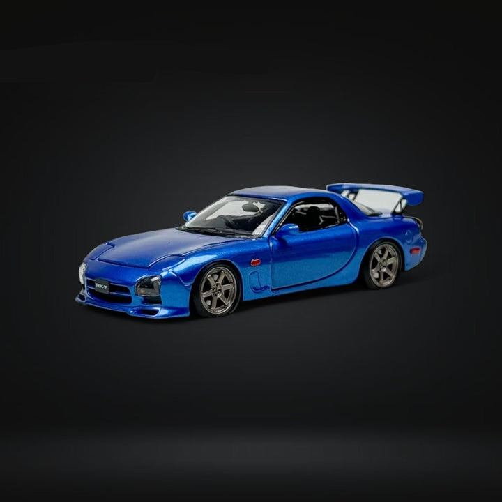 Mazda RX-7 FD3S Metallic Blue Fully Openeable Luxury Base 1:64 by PGM Driver Side Angle View