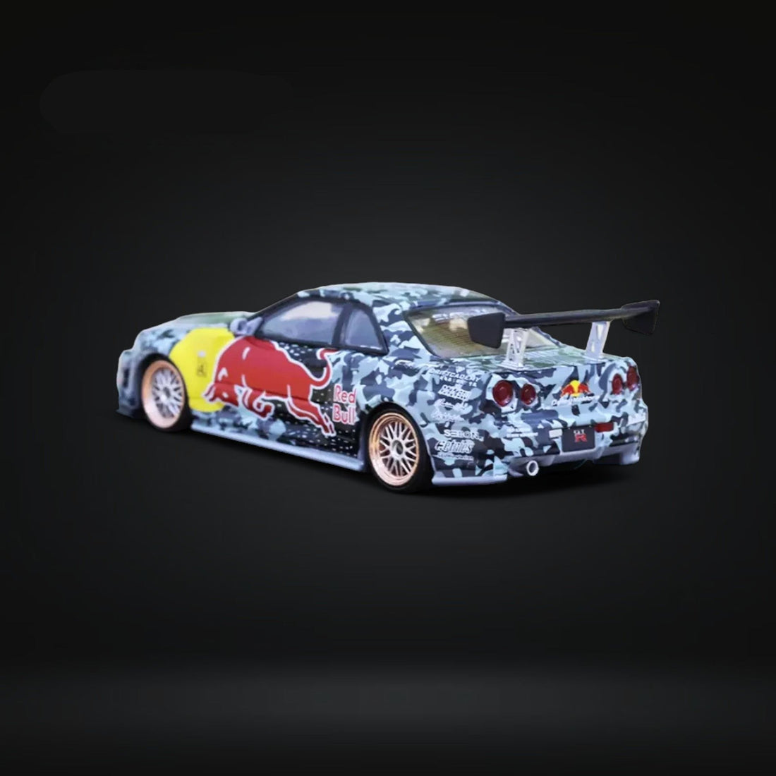 Nissan Skyline GT-R R34 Z-Tune in Red Bull Livery 1:64 Diecast Driver Side View