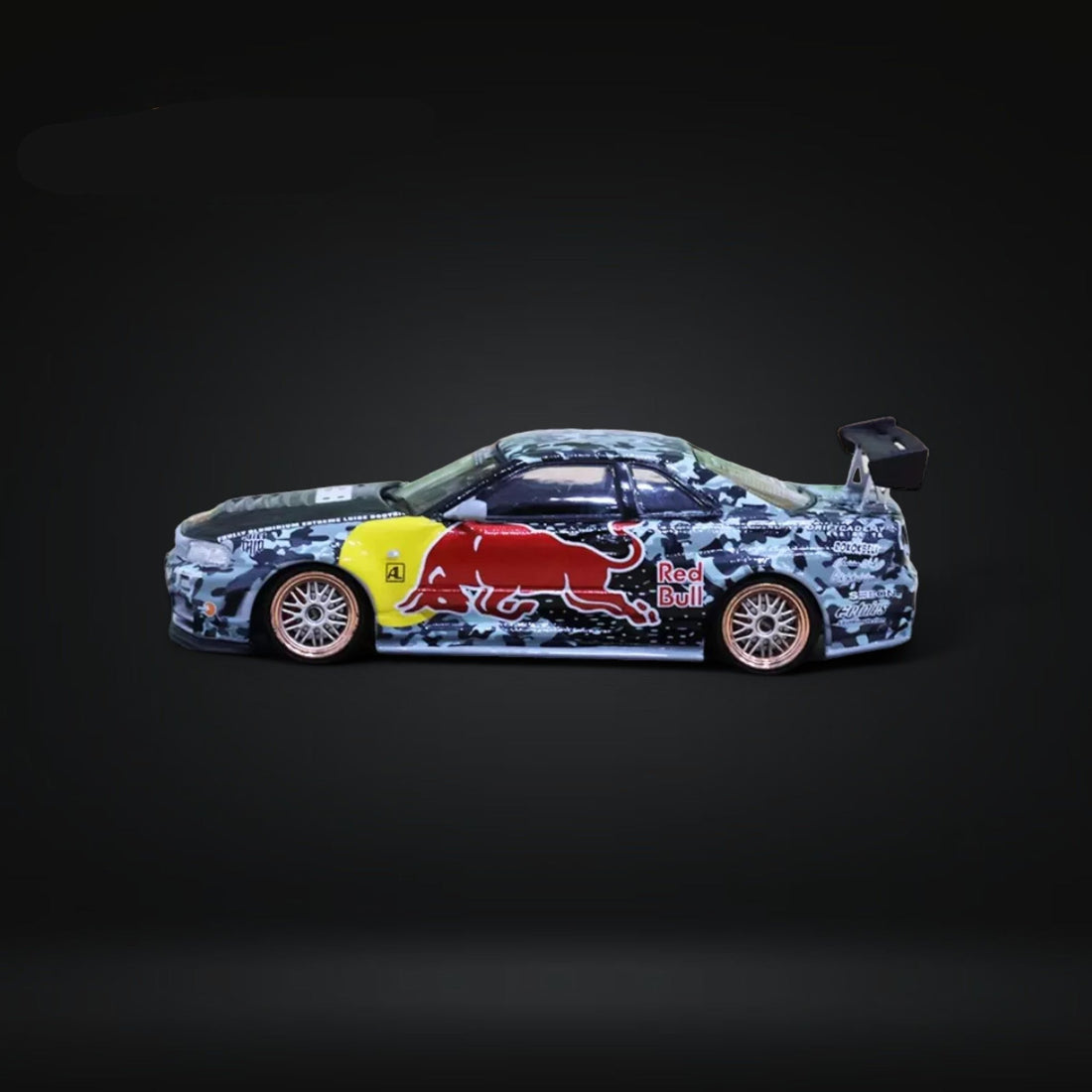 Nissan Skyline GT-R R34 Z-Tune in Red Bull Livery 1:64 Diecast Side View 3