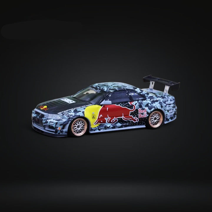 Nissan Skyline GT-R R34 Z-Tune in Red Bull Livery 1:64 Diecast Left Side View