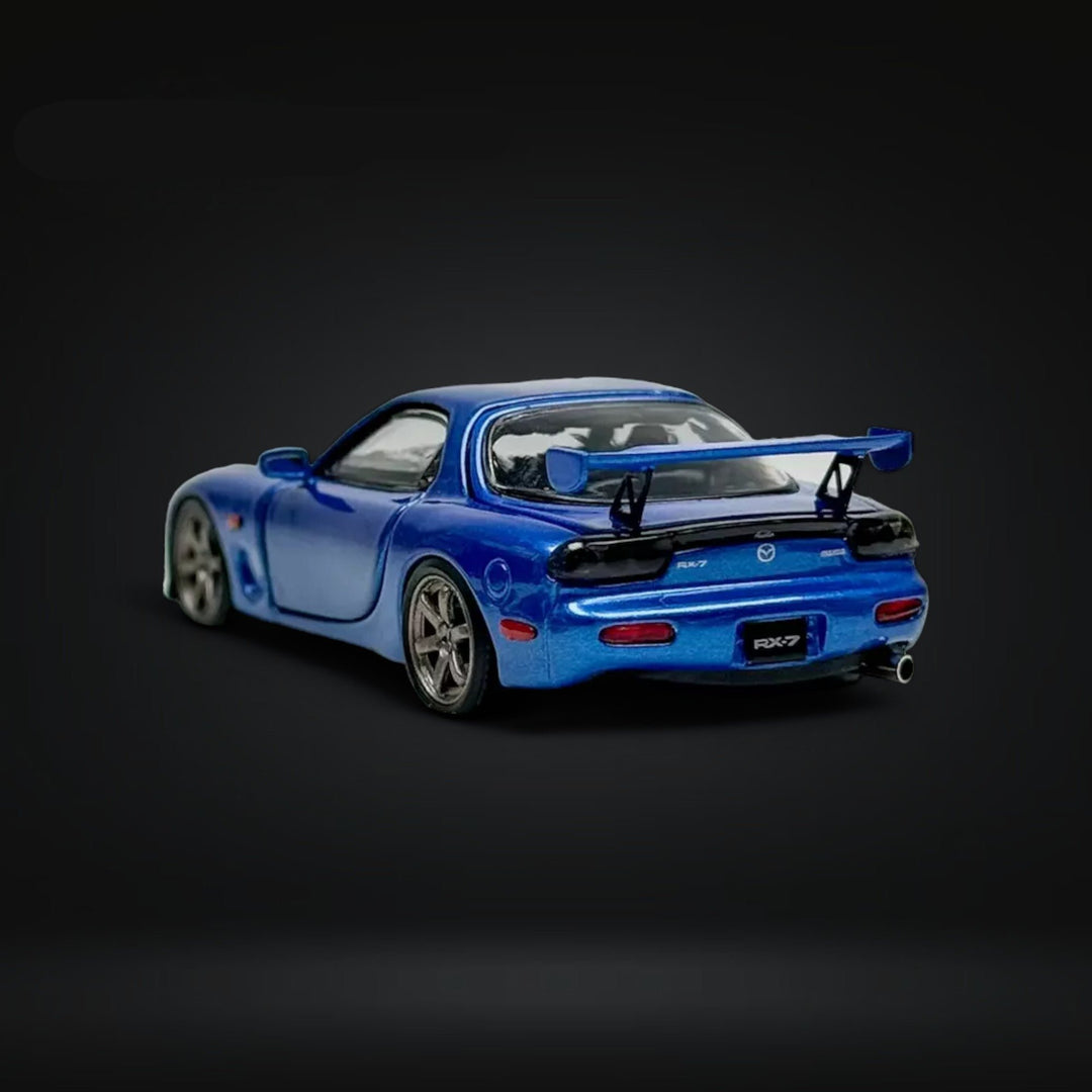 Mazda RX-7 FD3S Metallic Blue Fully Openeable Standard Base 1:64 by PGM Angled Rear View