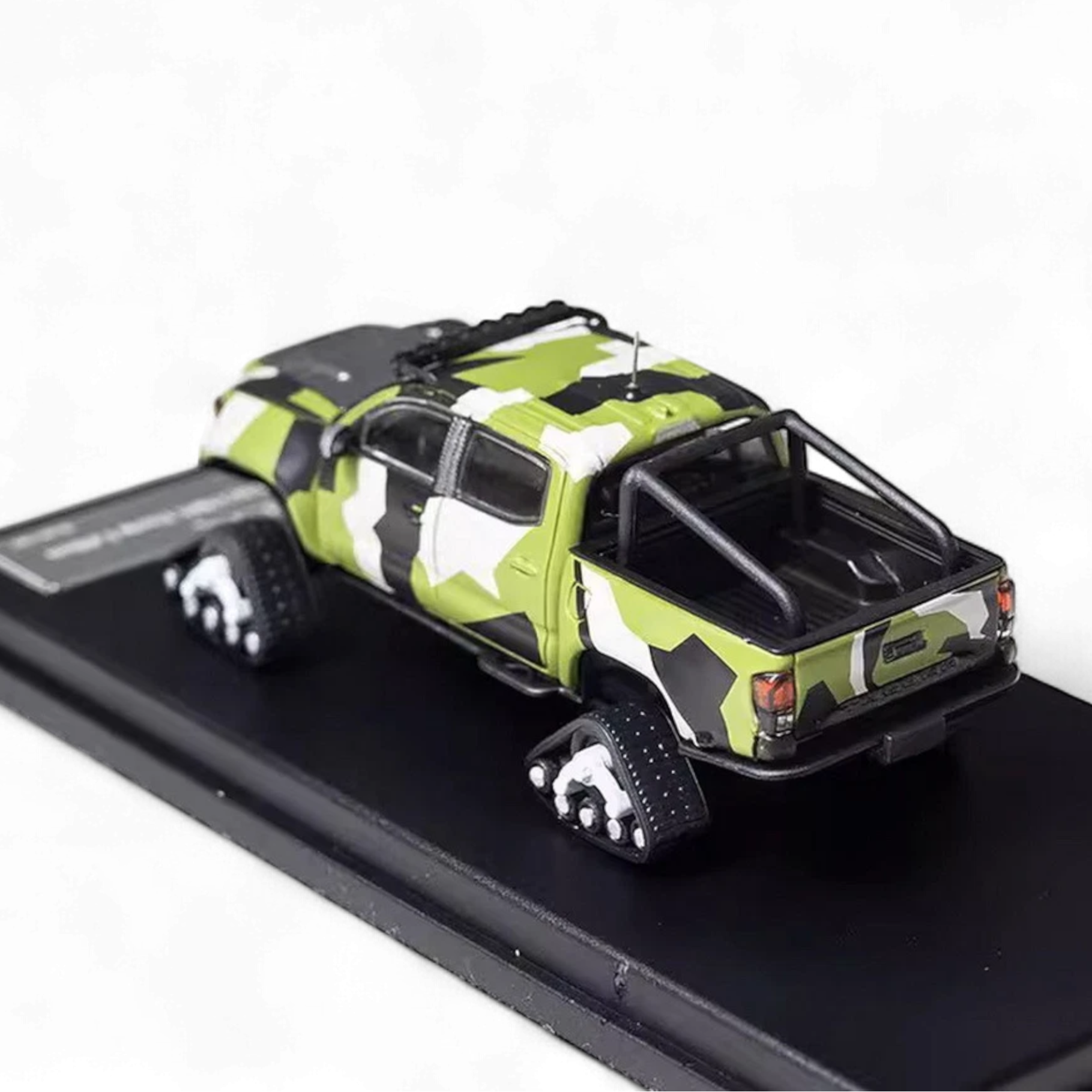 Toyota TACOMA SNOW VERSION in Green Camo & 3PMSF Tires 1:64 by GCD 2
