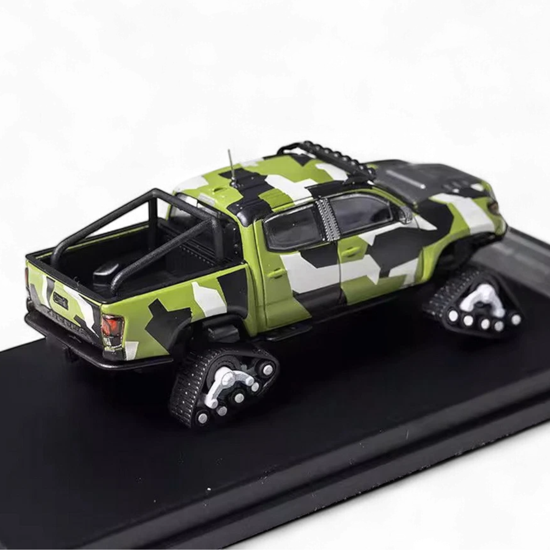 Toyota TACOMA SNOW VERSION in Green Camo & 3PMSF Tires 1:64 by GCD 3
