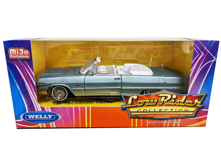 1963 Chevrolet Impala Convertible Lowrider Light Blue Metallic with White Interior "Low Rider Collection" 1/24 Diecast Model Car by Welly-0